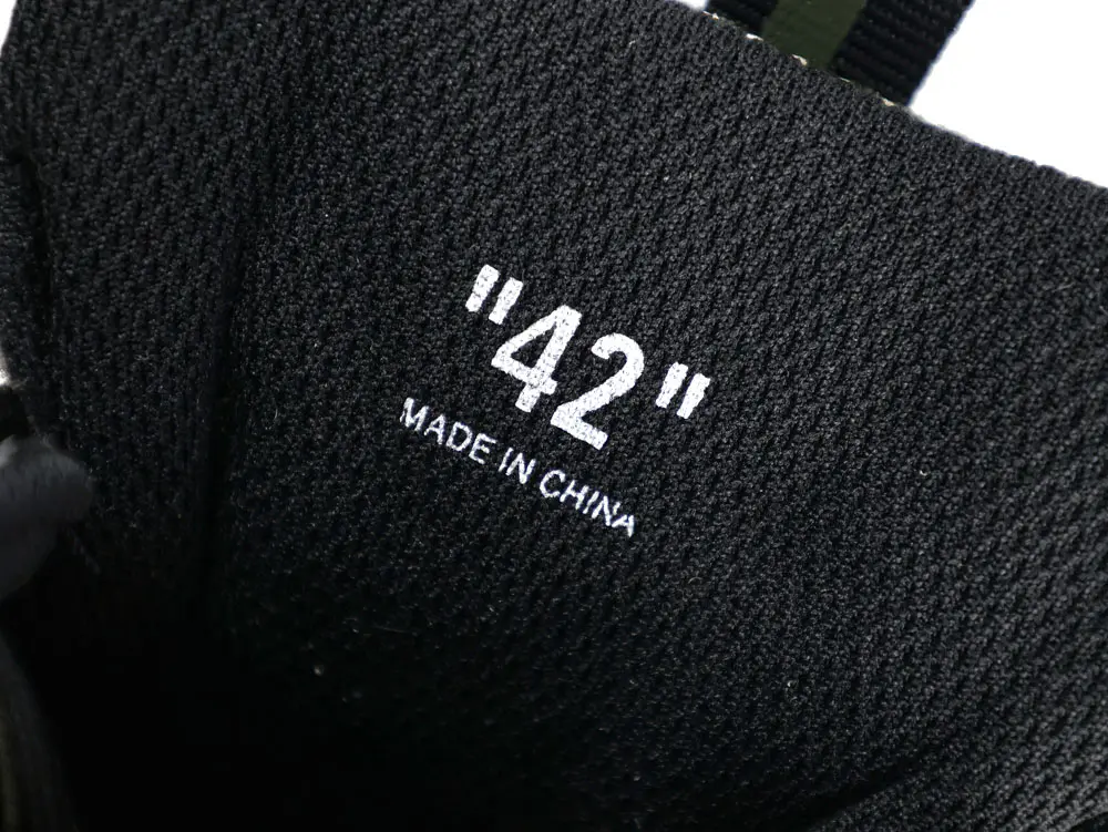 Close-up of interior size marking showing number 42 and made in China text on fabric lining