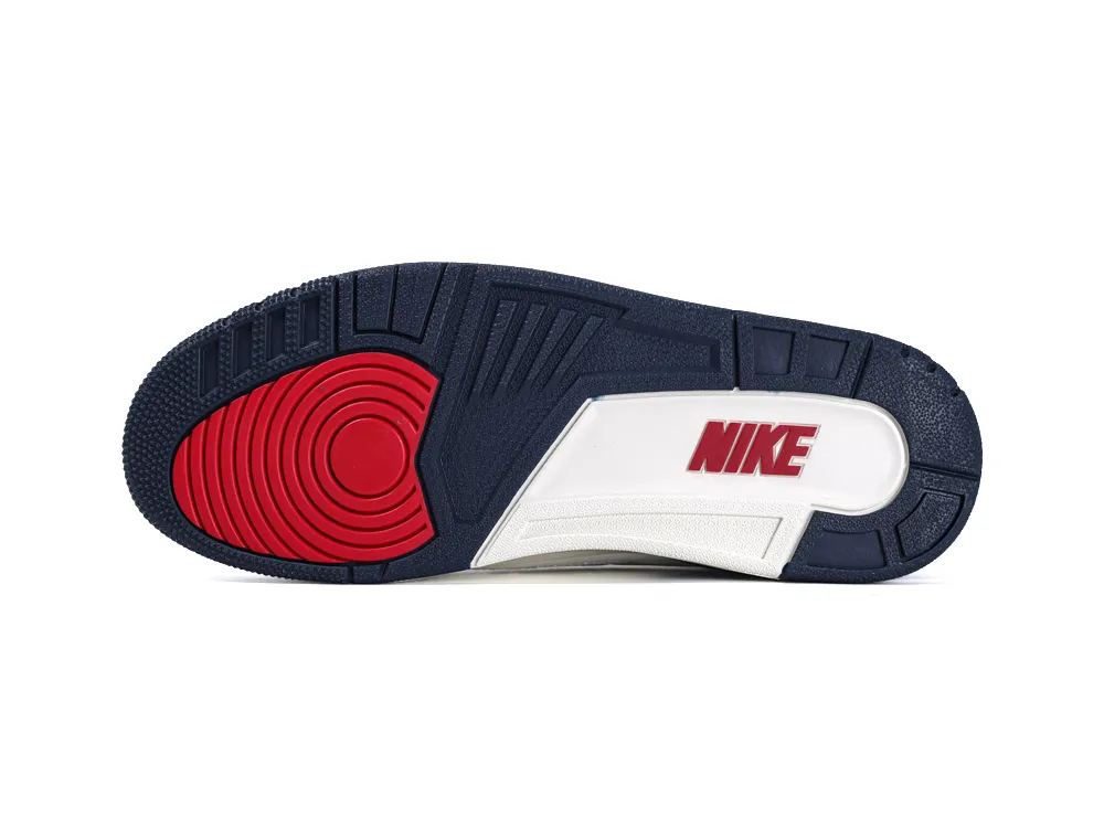 Full view of the rubber outsole in navy blue, white, and gym red with a centered Nike logo.