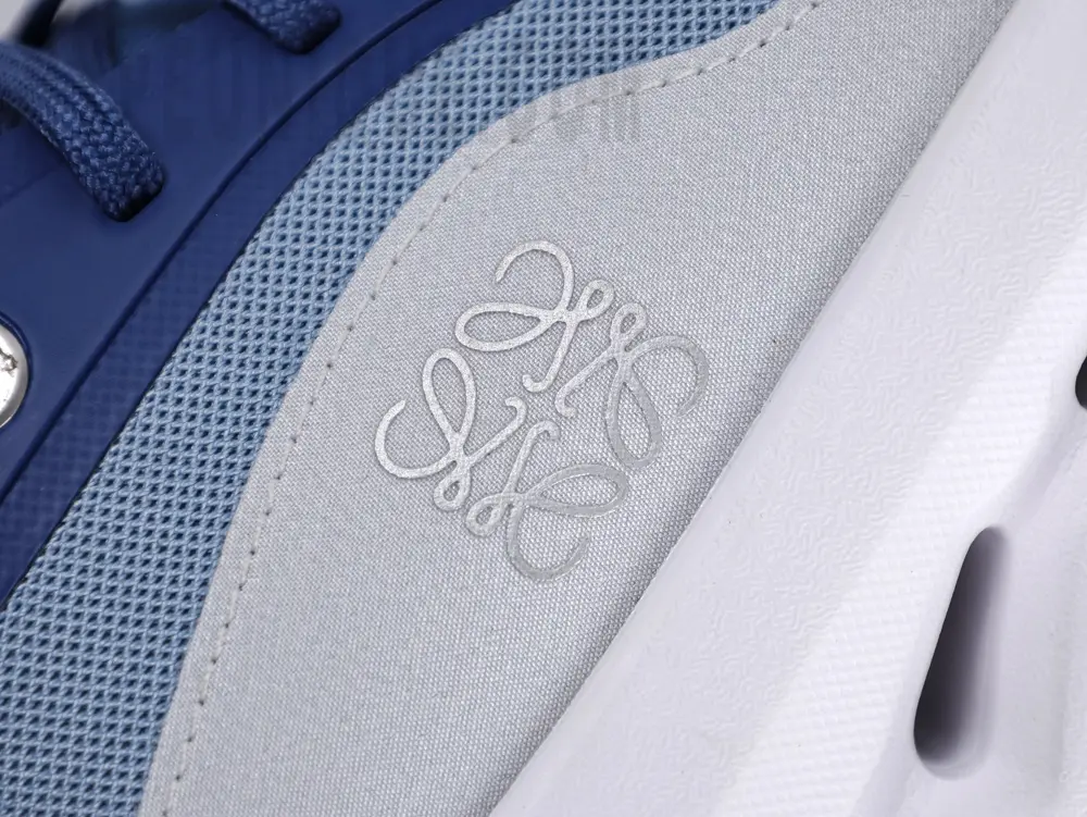 Grey logo on the outside of the shoe