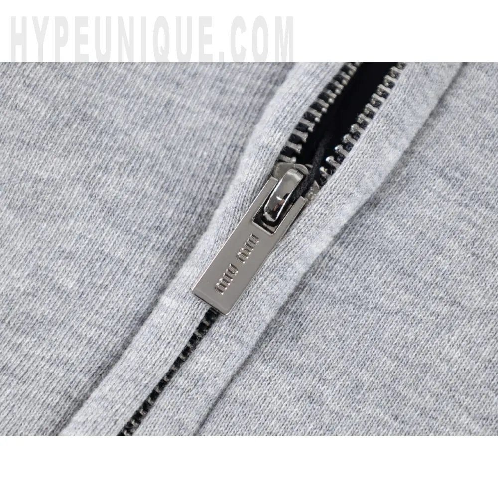The zipper on the clothes