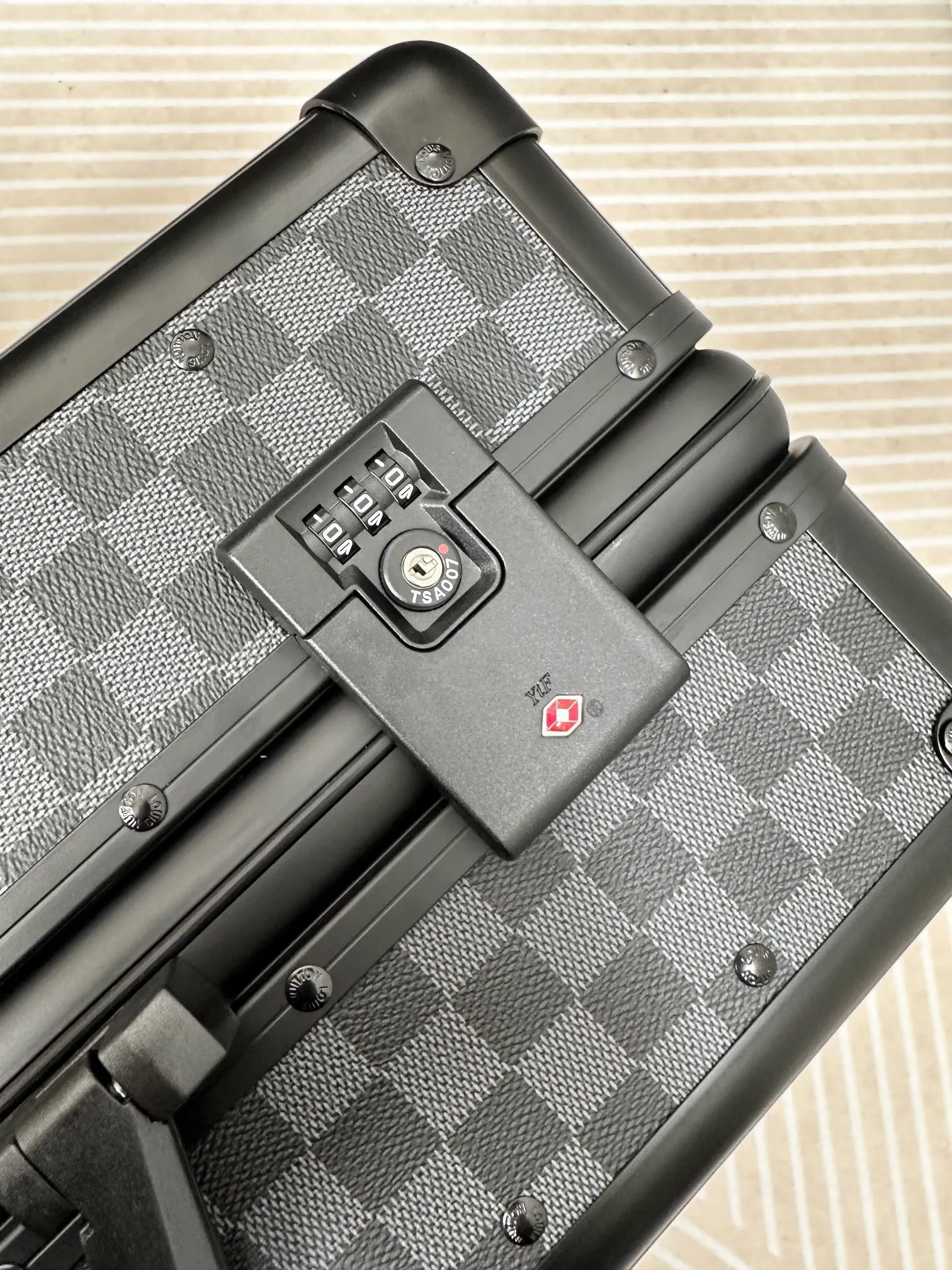 Damier Graphite luggage combination lock detail