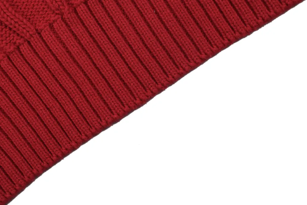Red knitted fabric with ribbed texture