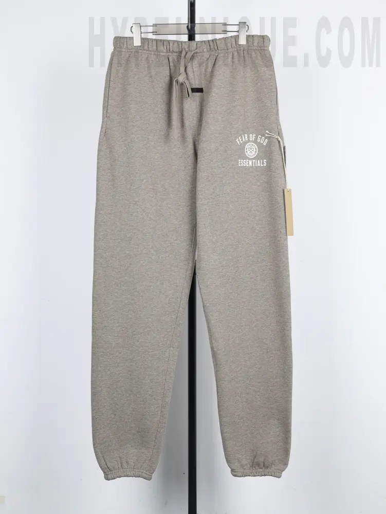 the grey Fear of God Essentials Heavy Fleece Sweatpant