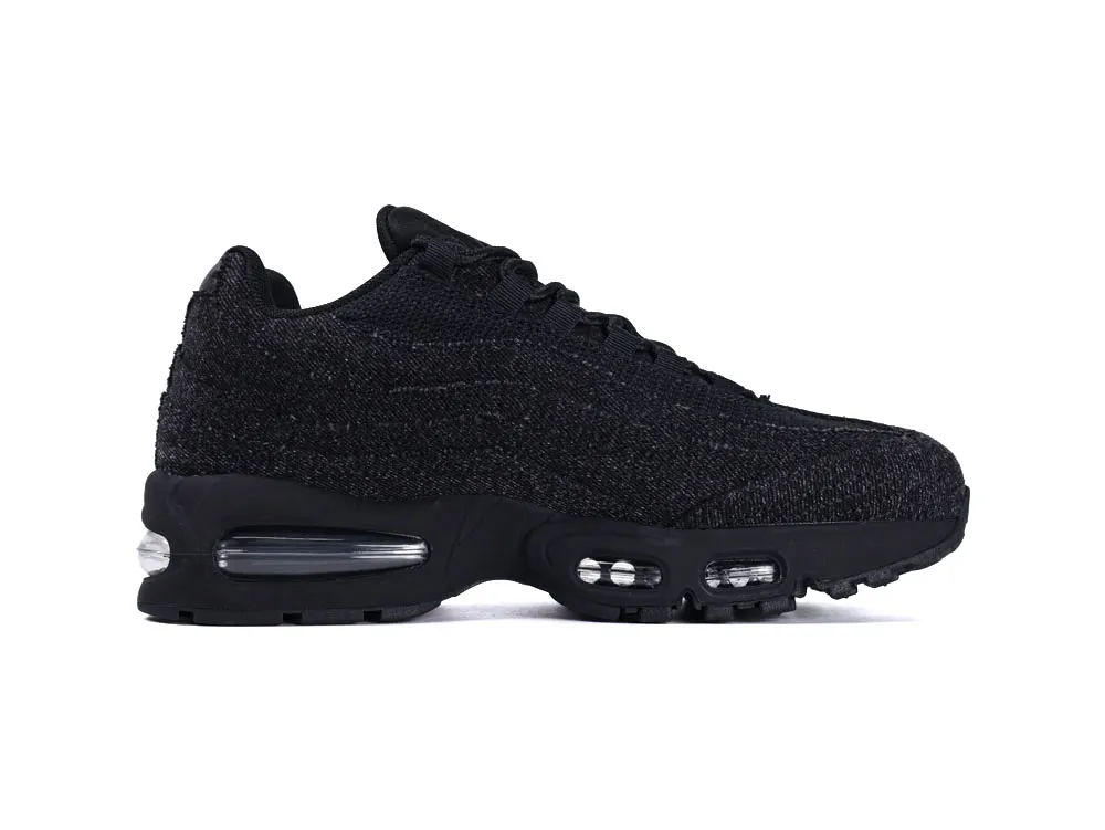 Black knit sneaker with visible air cushioning and rubber sole.