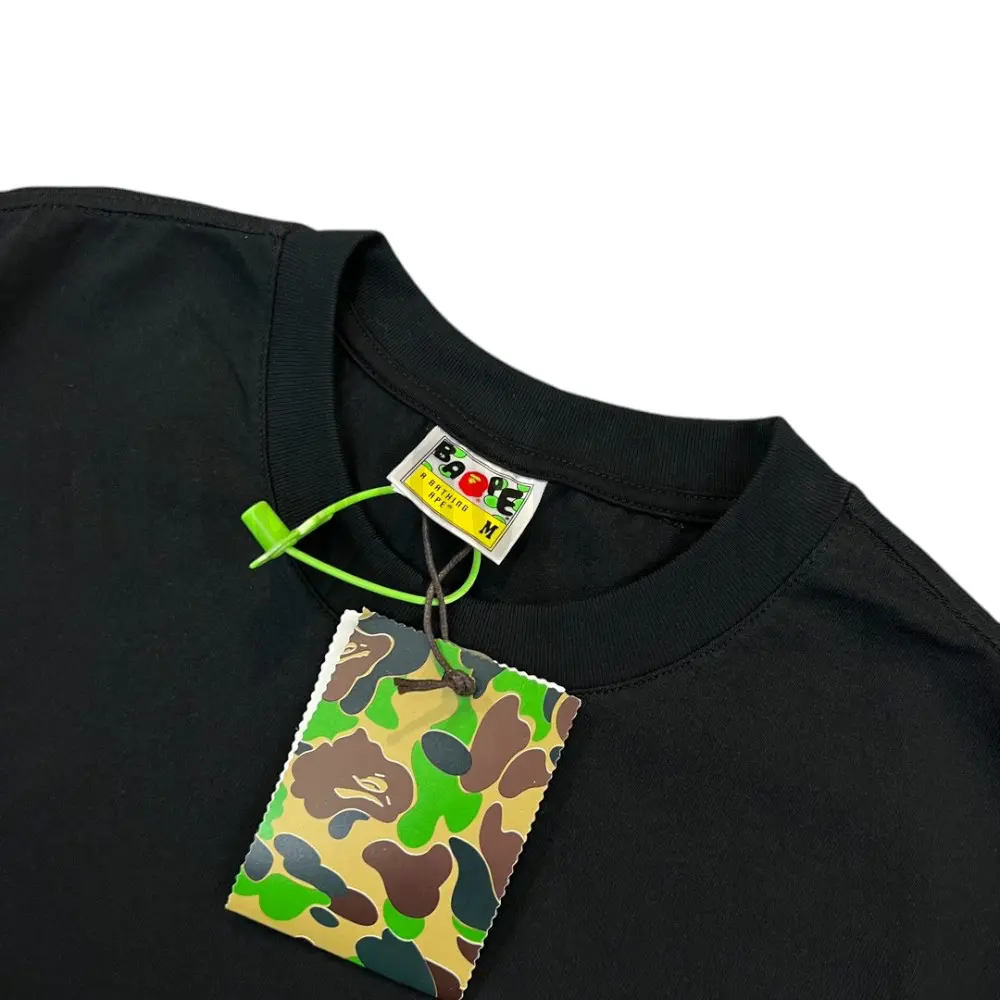 Neckline tag close-up, displaying garment care symbols and brand information with fashion-forward presentation.