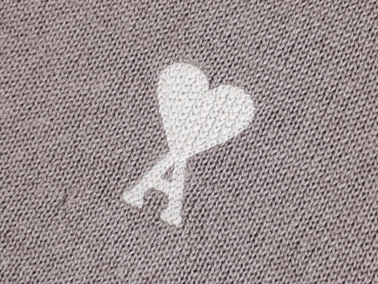 White heart and letter 'A' design.