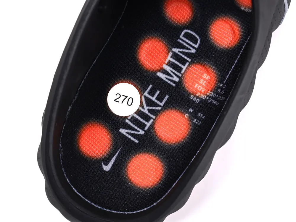 Black insole with orange dots, synthetic material, branded text visible.
