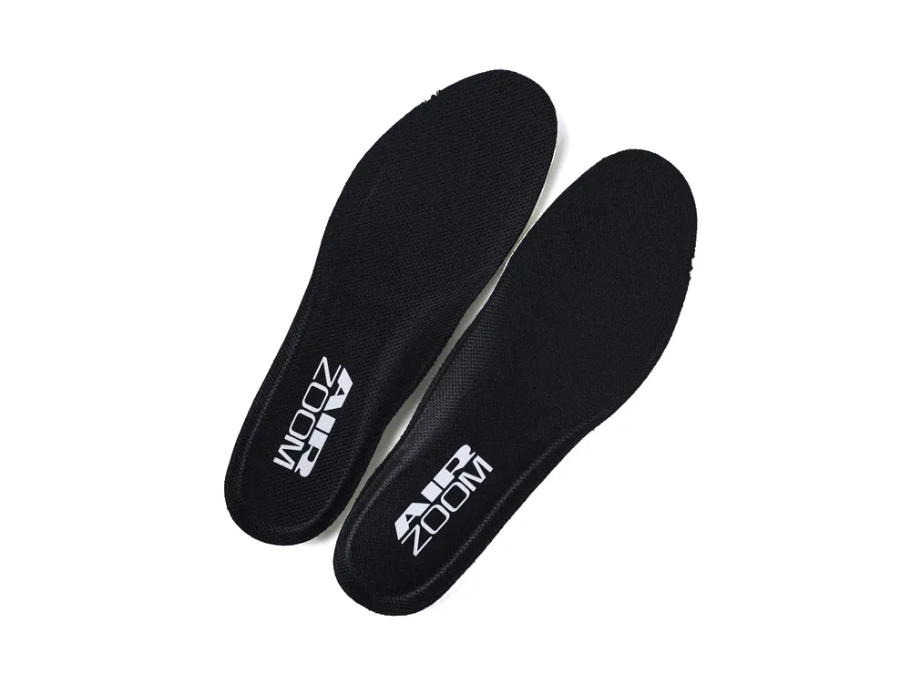 Black insoles made of soft material with "AIR ZOOM" branding in white text.