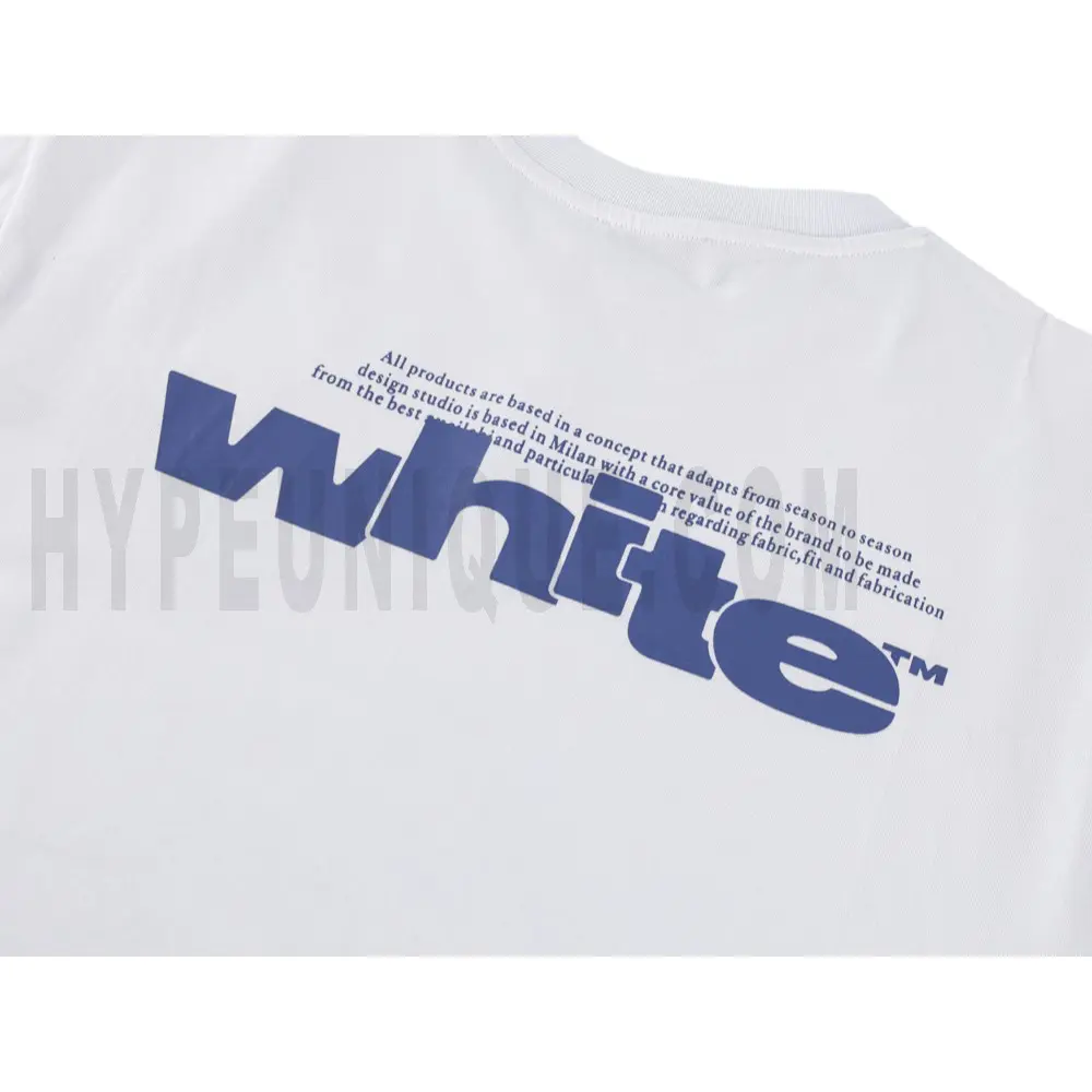 Detailed shot capturing the graphic print on the white tee's back panel.