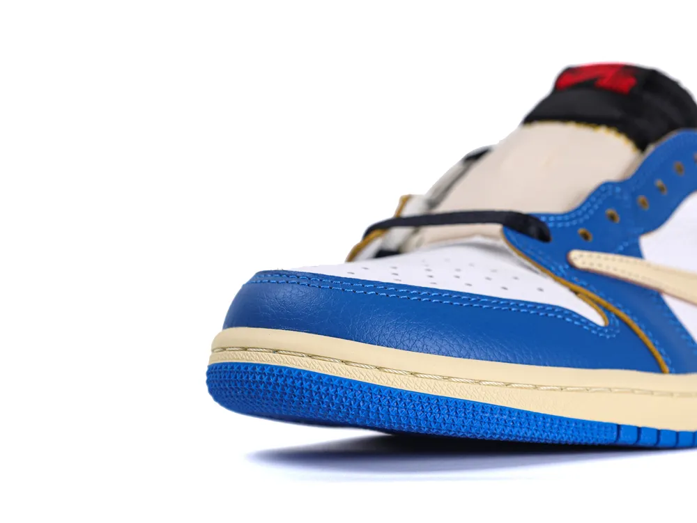Blue and cream leather sneaker with perforated white toe and black laces.