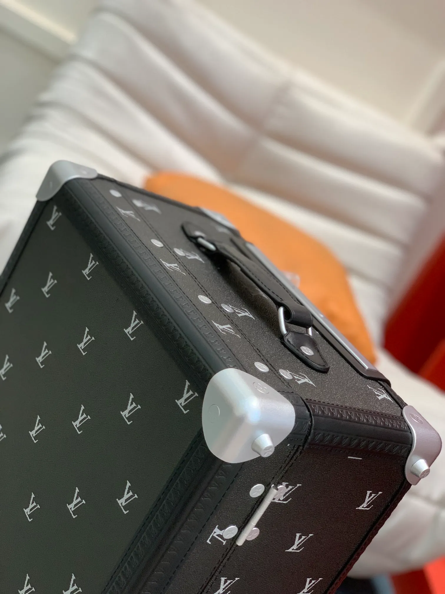 Rolling Trunk Black Monogram Carry-On Suitcase Top Handle And Corner Detail