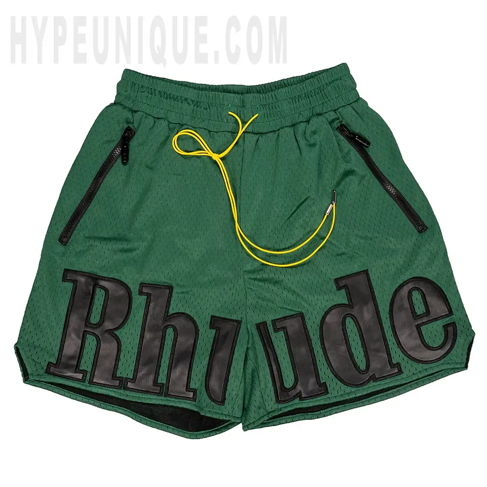 The dark green shorts