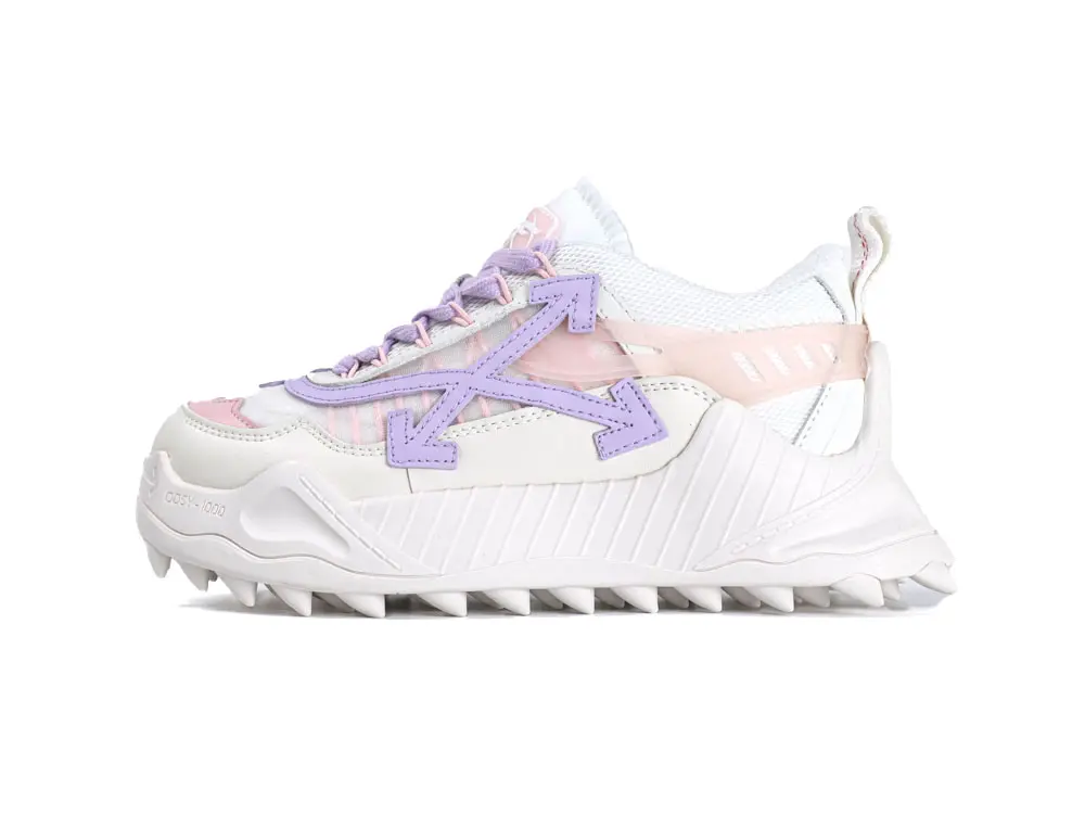 White leather sneaker with purple accents, pink details, and textured sole design.