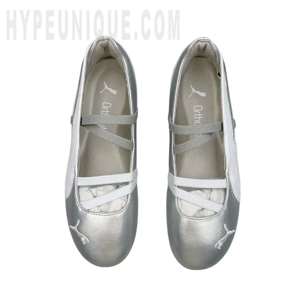 A pair of the silver shoes