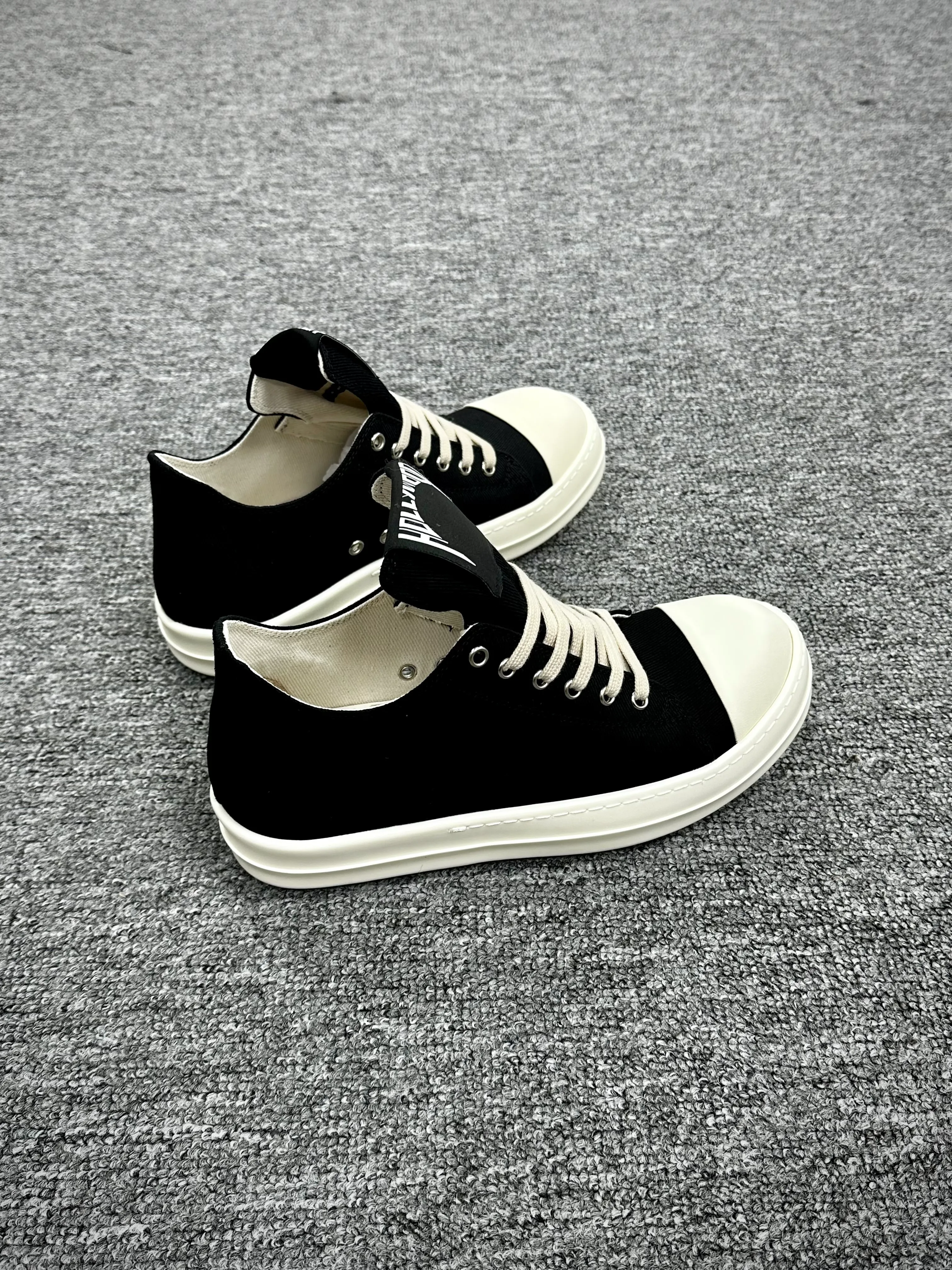 R 0wens DRKSHDW Hollywood Slip-On Low BlackMilk Sneakers Angeled View