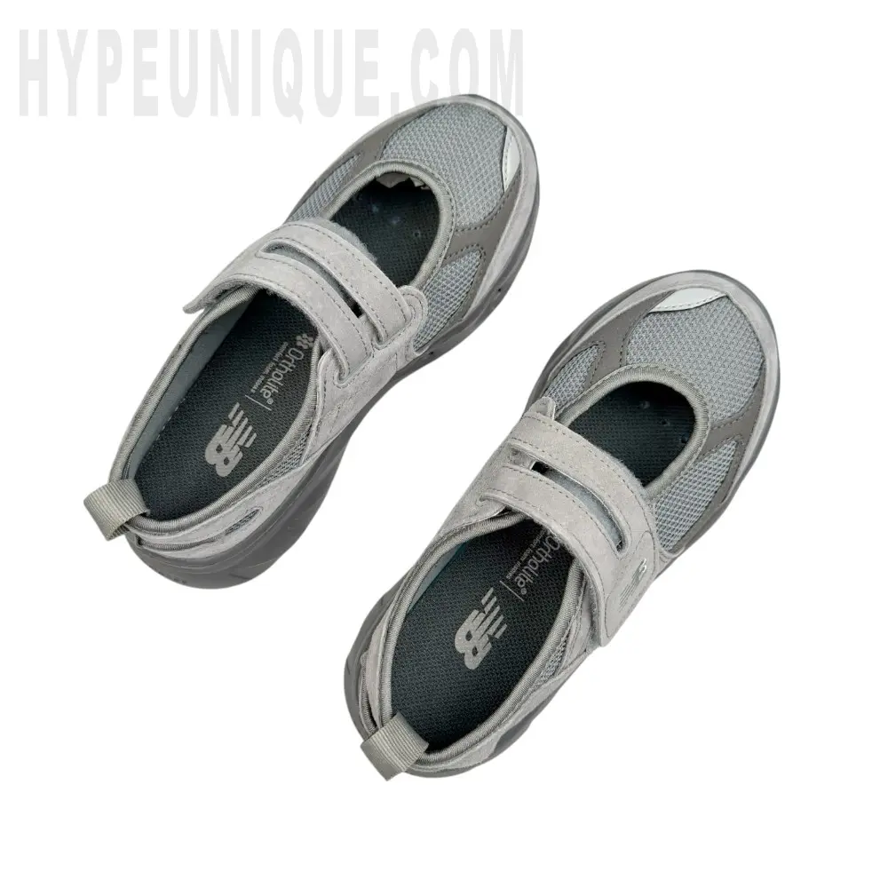 A pair of the gray shoes
