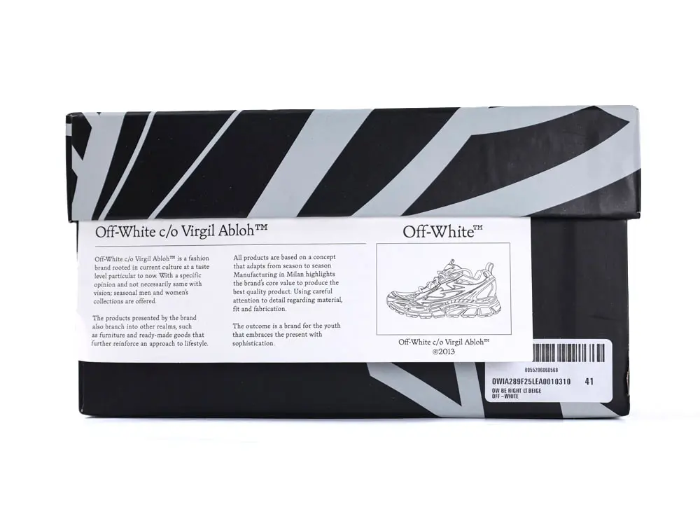 Black and gray shoe box with diagonal stripes and Off-White branding.