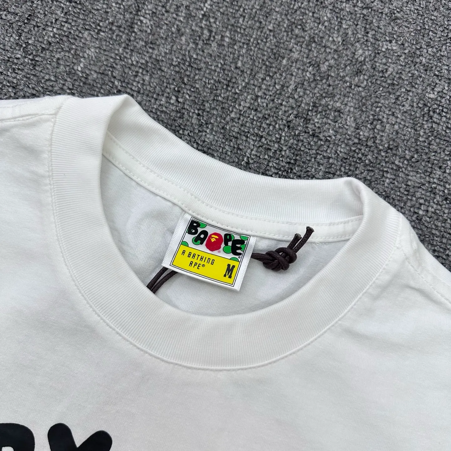 Neckline with visible Brand Tag