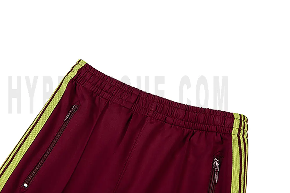 Back detail view of the red pants.