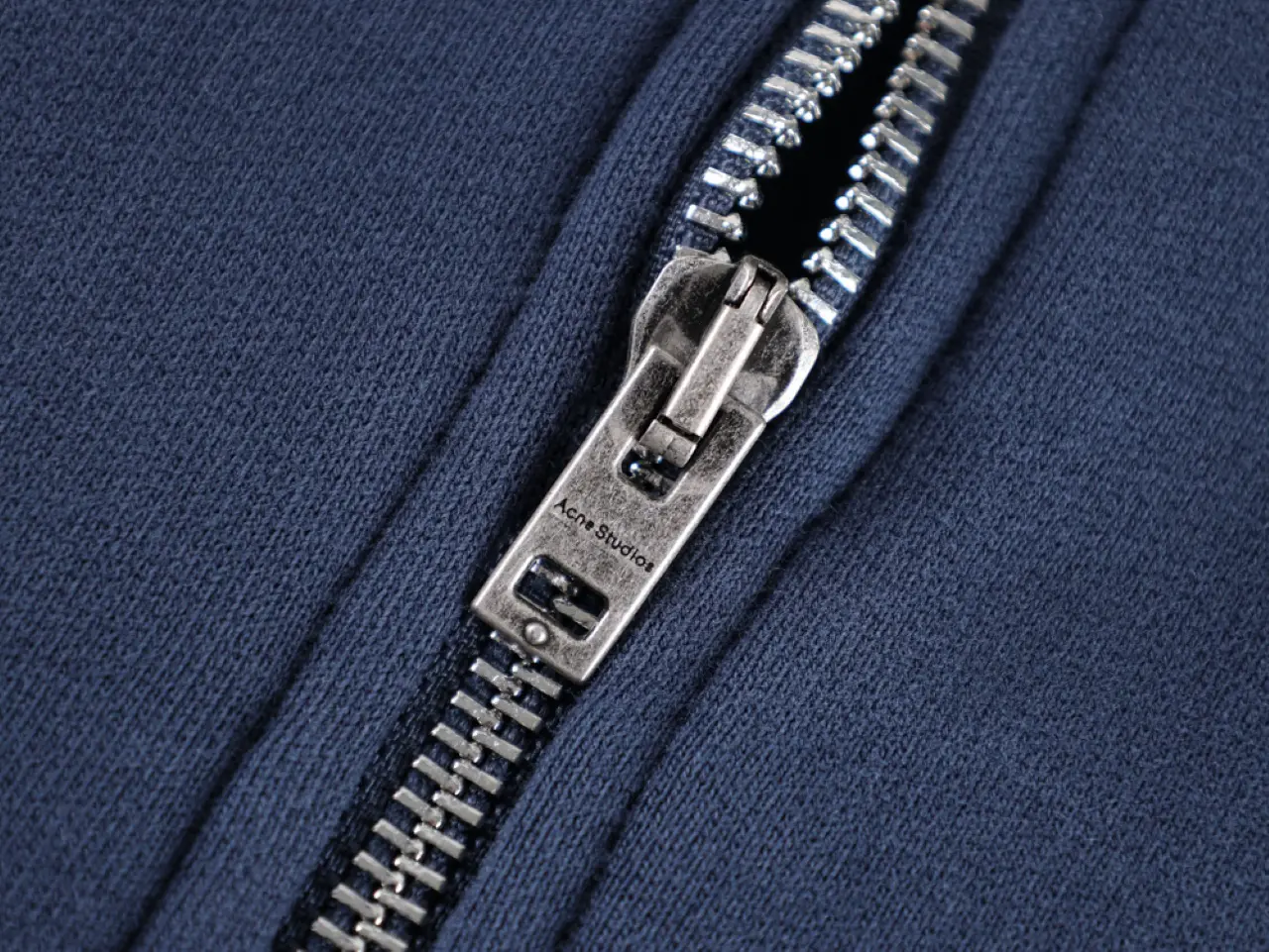 Display of hip-length and metal distressed buttons