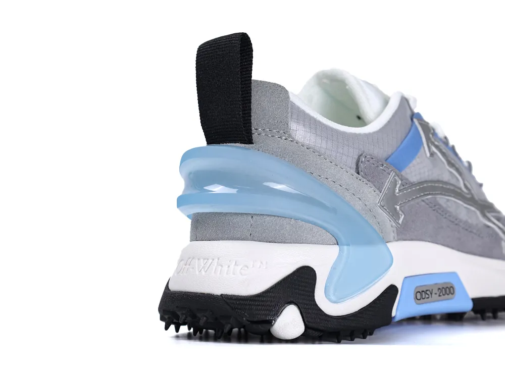 Gray and blue sneaker heel with black pull tab and textured sole.