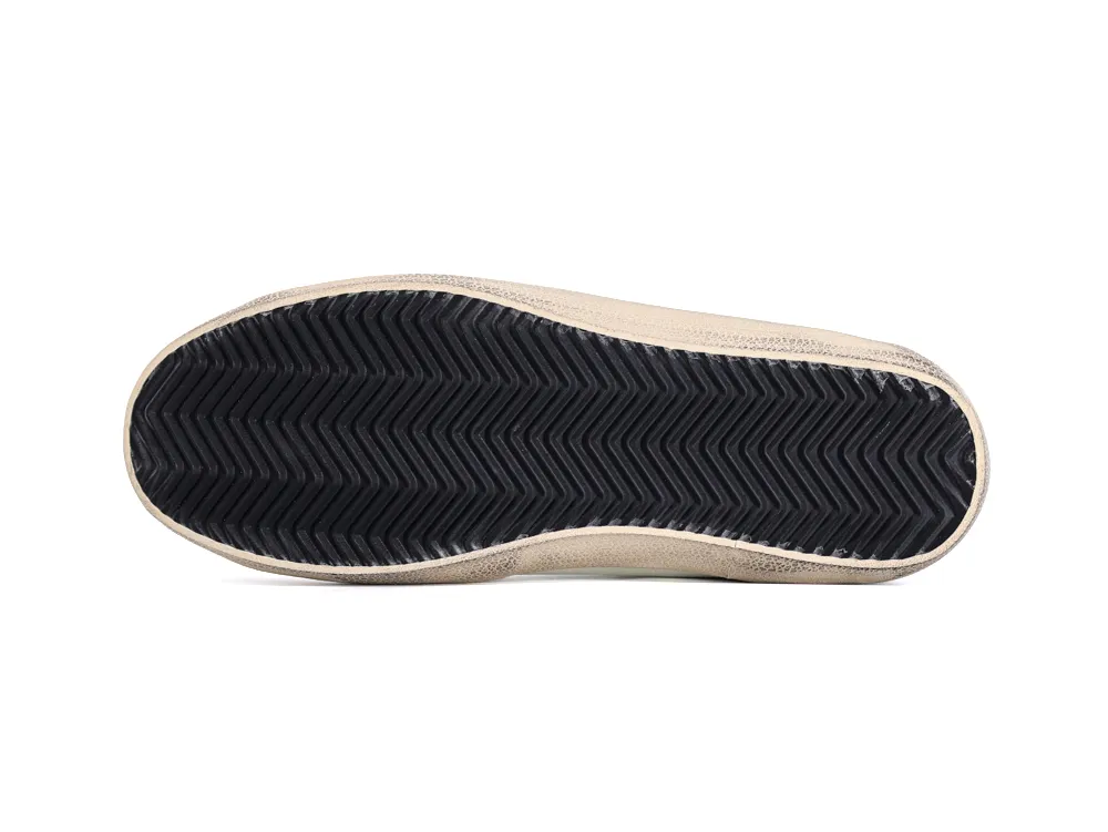 Black herringbone rubber outsole of Golden Goose Super Star sneaker