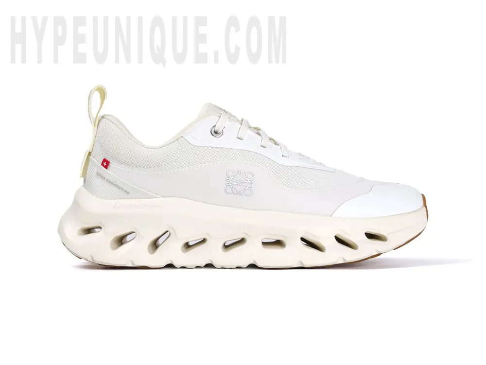 Front view of the right shoe inner side of the On Cloudtilt Loewe 2 ‘All White’, showcasing the all-white design and breathable mesh material.