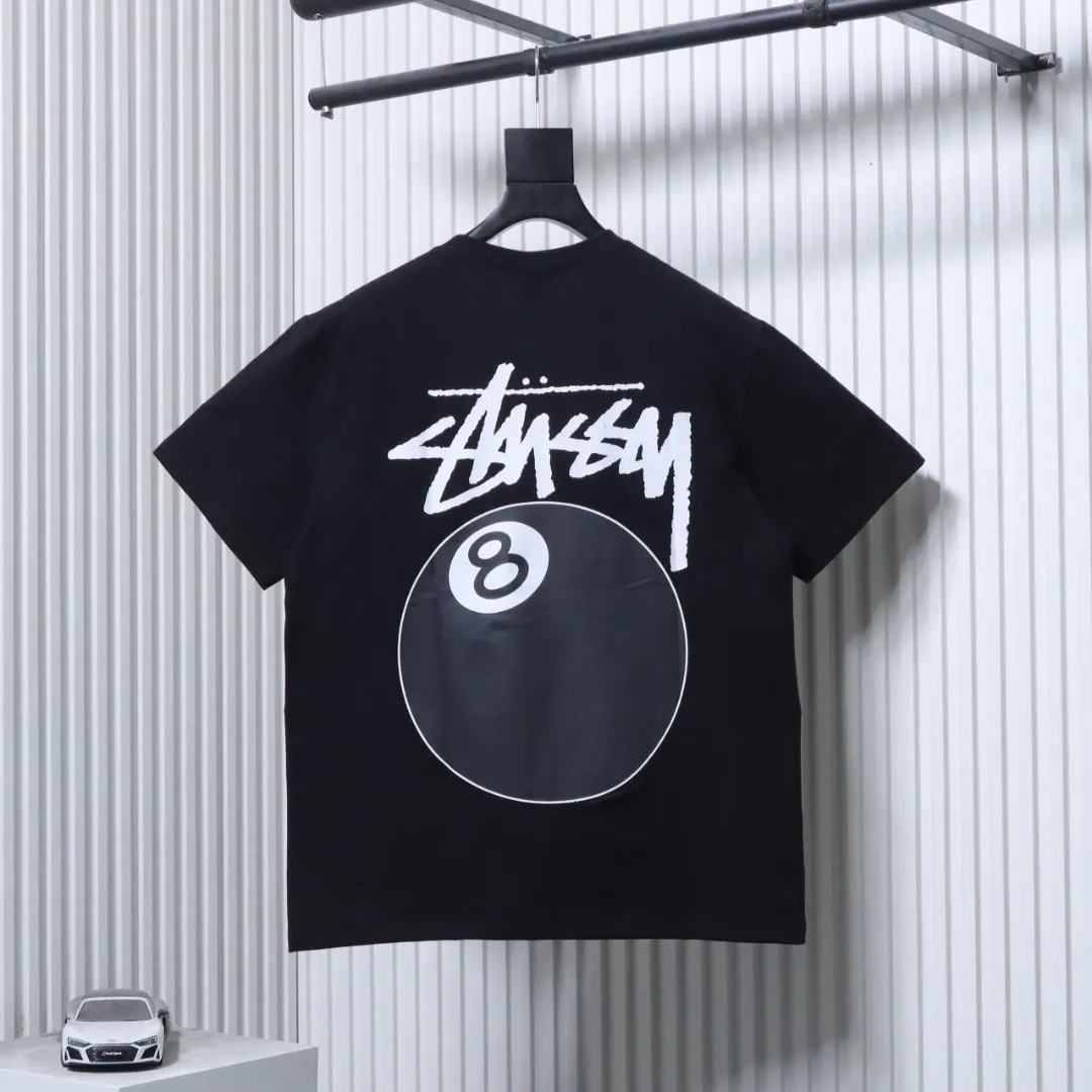 Back of Stussy Black 8 Ball Print Short Sleeve T-Shirt Color Black