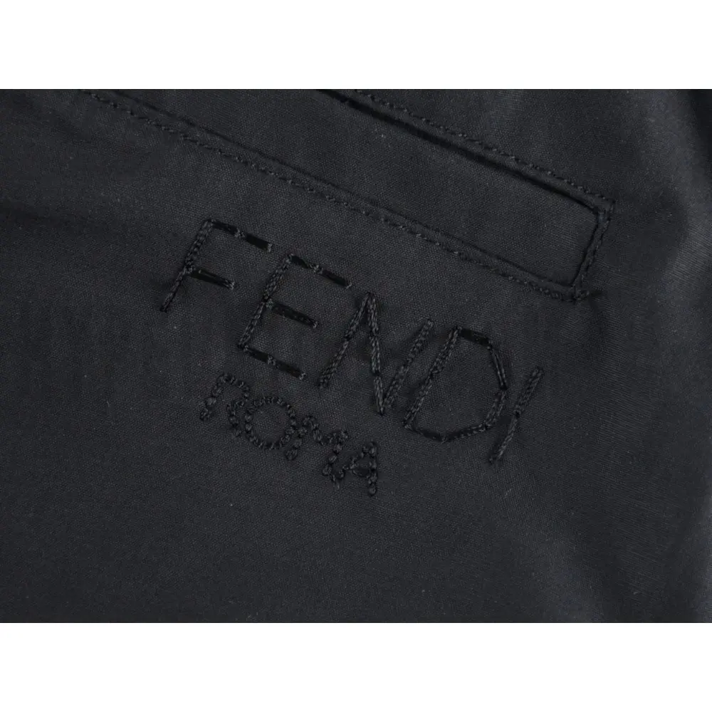 Branded embroidery on the shorts