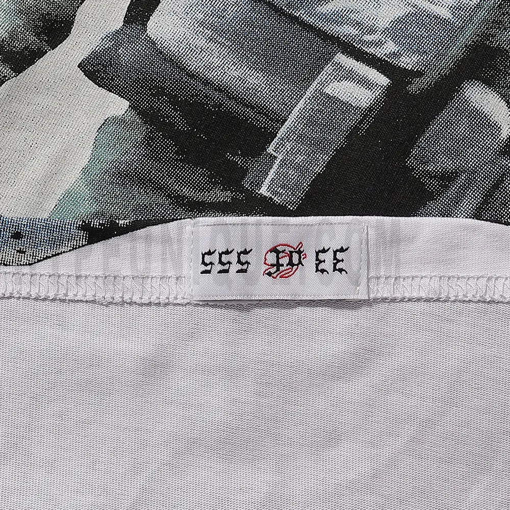 Clean hemline finish with a modern cut, highlighting the T-shirt's streetwear aesthetic.