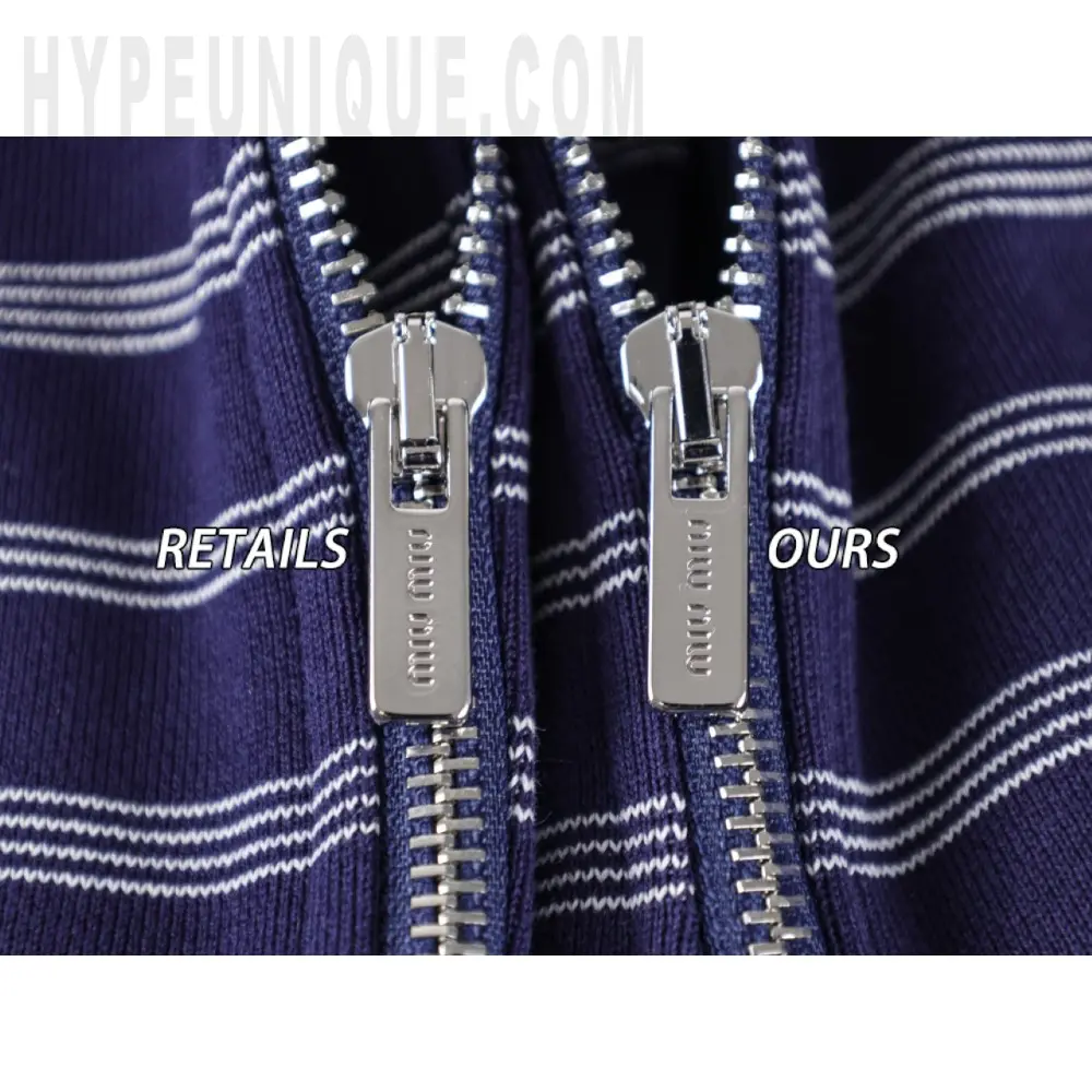 a zipper on a blue and white striped fabric