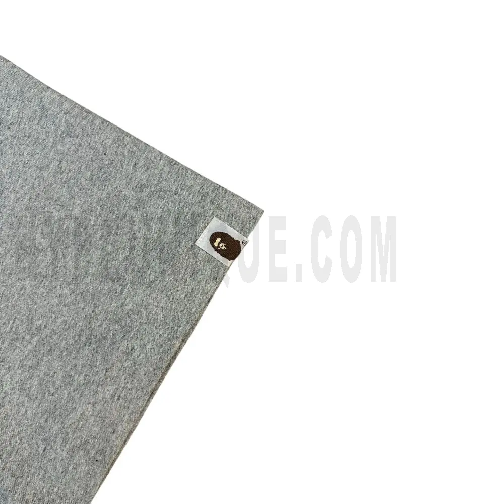 The sleeves of the gray clothes