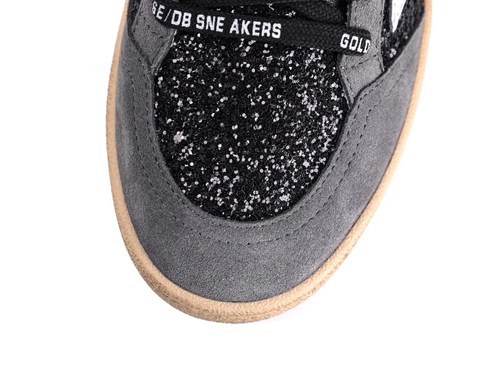 Top view of black glitter and grey suede toe area of Golden Goose Ball Star