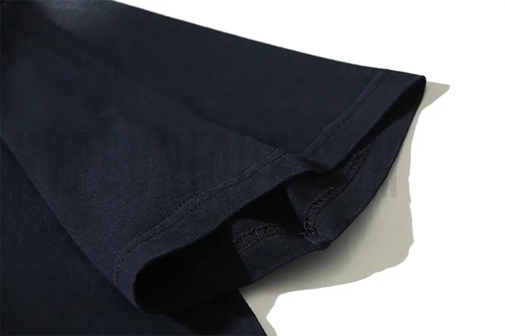 Precision cutting and sewing techniques on sleeves.