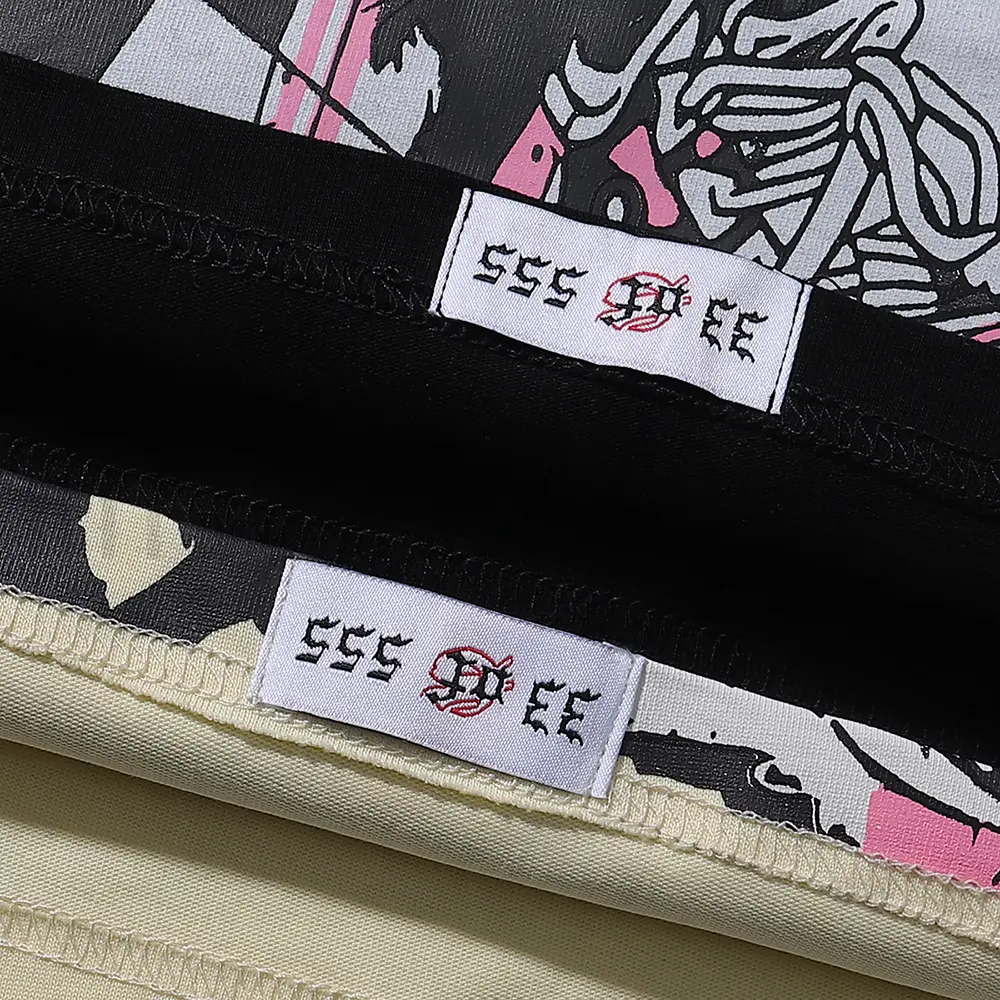 Clean hemline finish with a modern cut, highlighting the T-shirt's streetwear aesthetic.