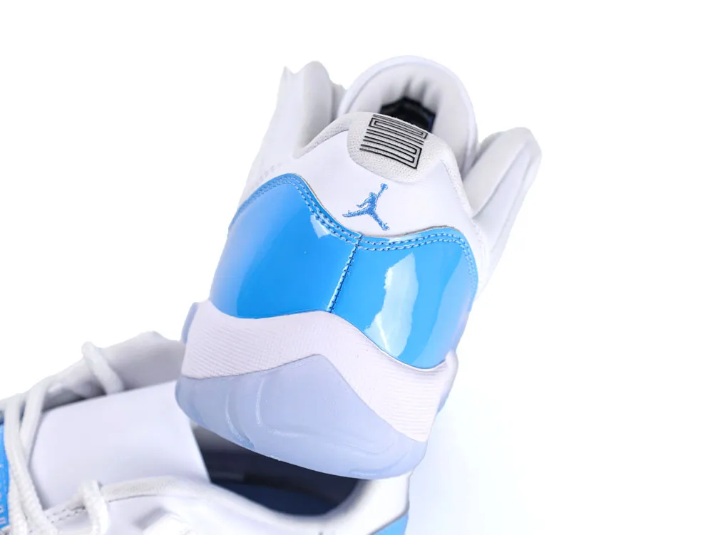 White and blue sneaker with glossy material and detailed stitching on heel.