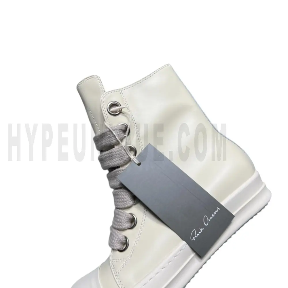 The side of the beige shoes