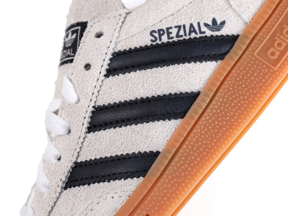 The outer brand logo has three bars.