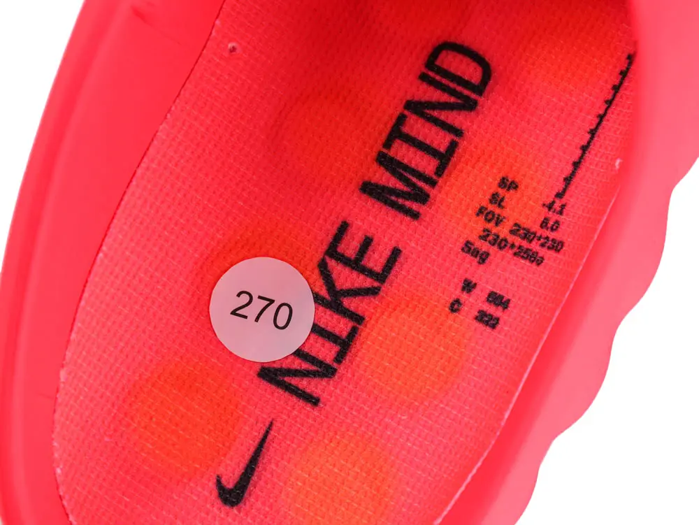Red synthetic shoe insole with black printed details, featuring a size label.