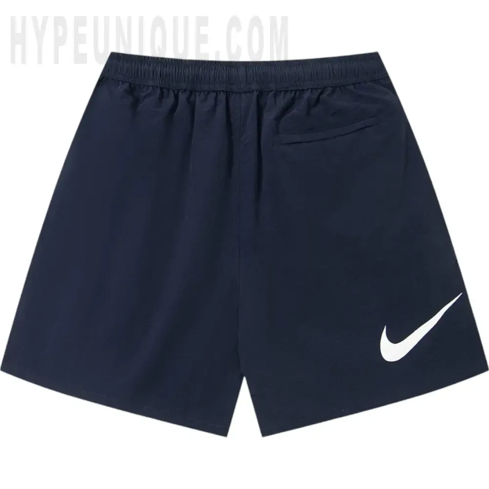The dark blue shorts