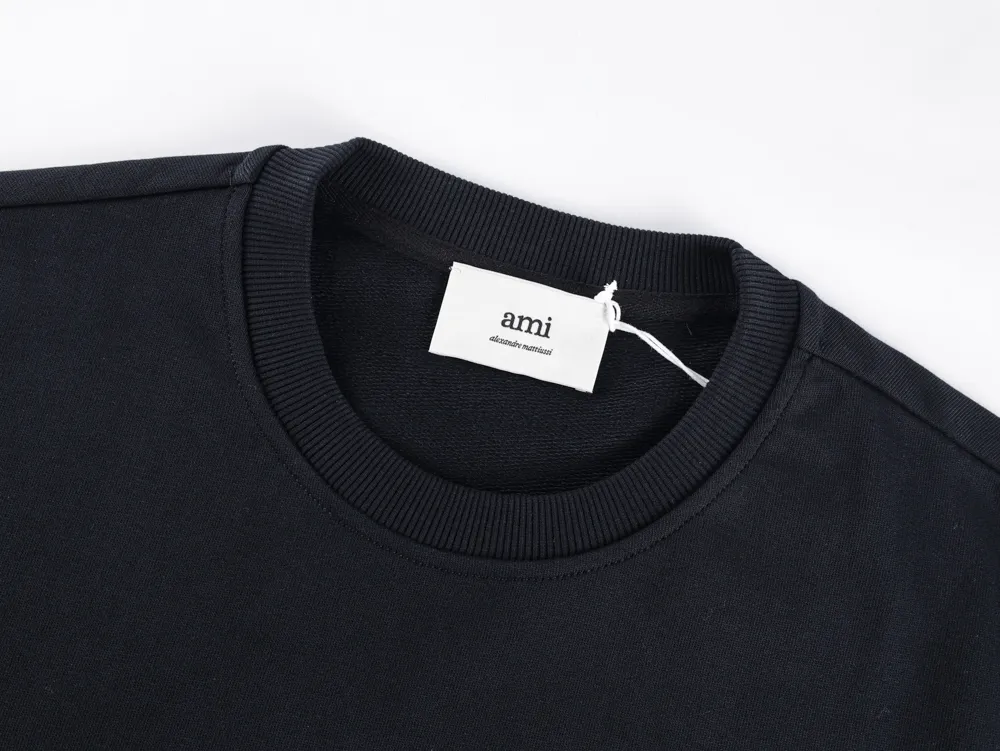 Sweatshirt with ribbed texture and brand label attached.