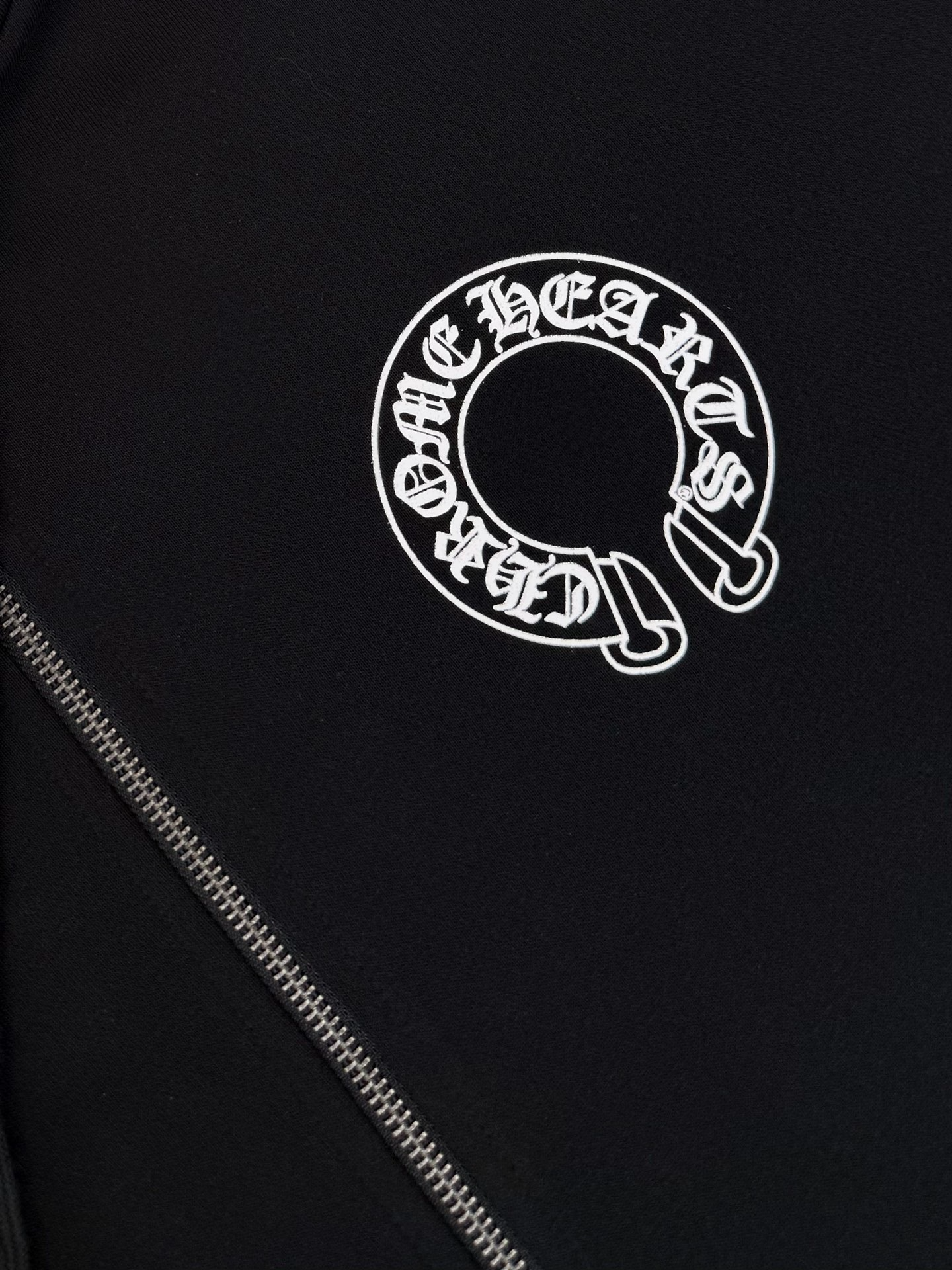 Black hoodie with floral design details