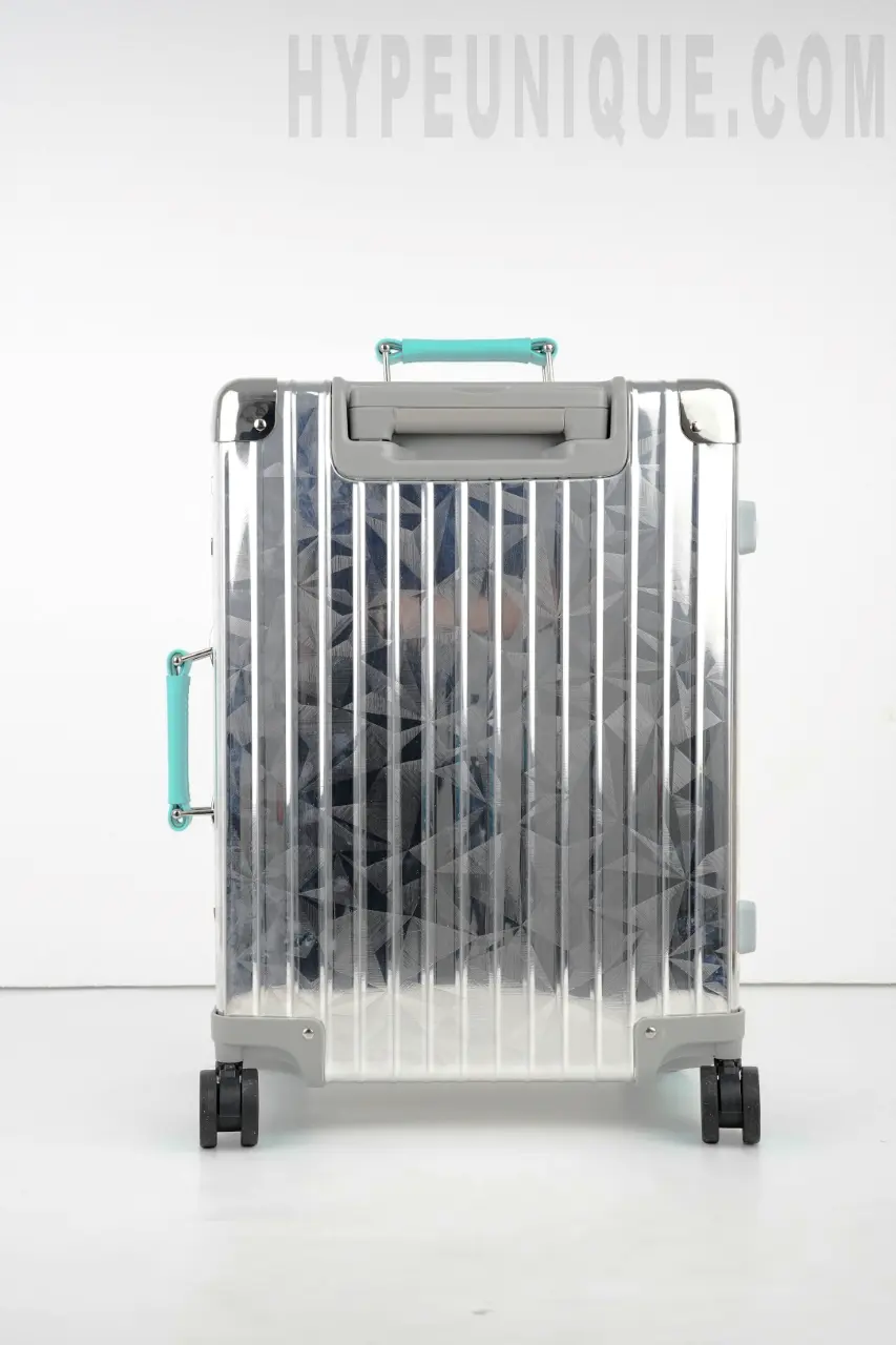 Silver Rolling Suitcase