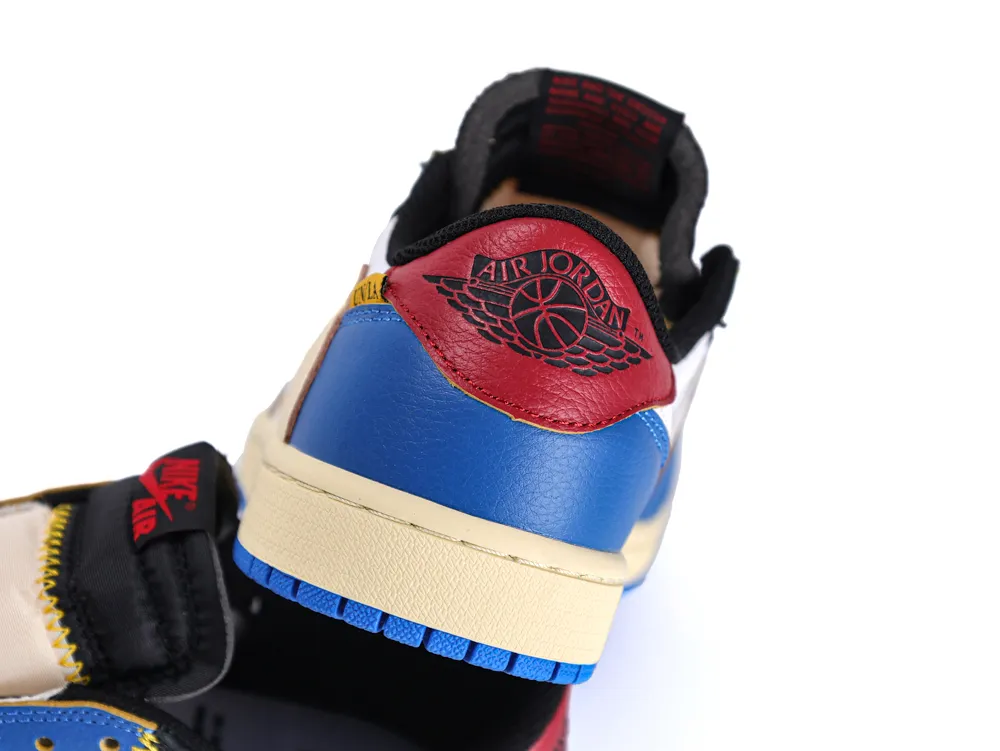 Red, blue, and beige leather sneaker heel with Air Jordan logo.