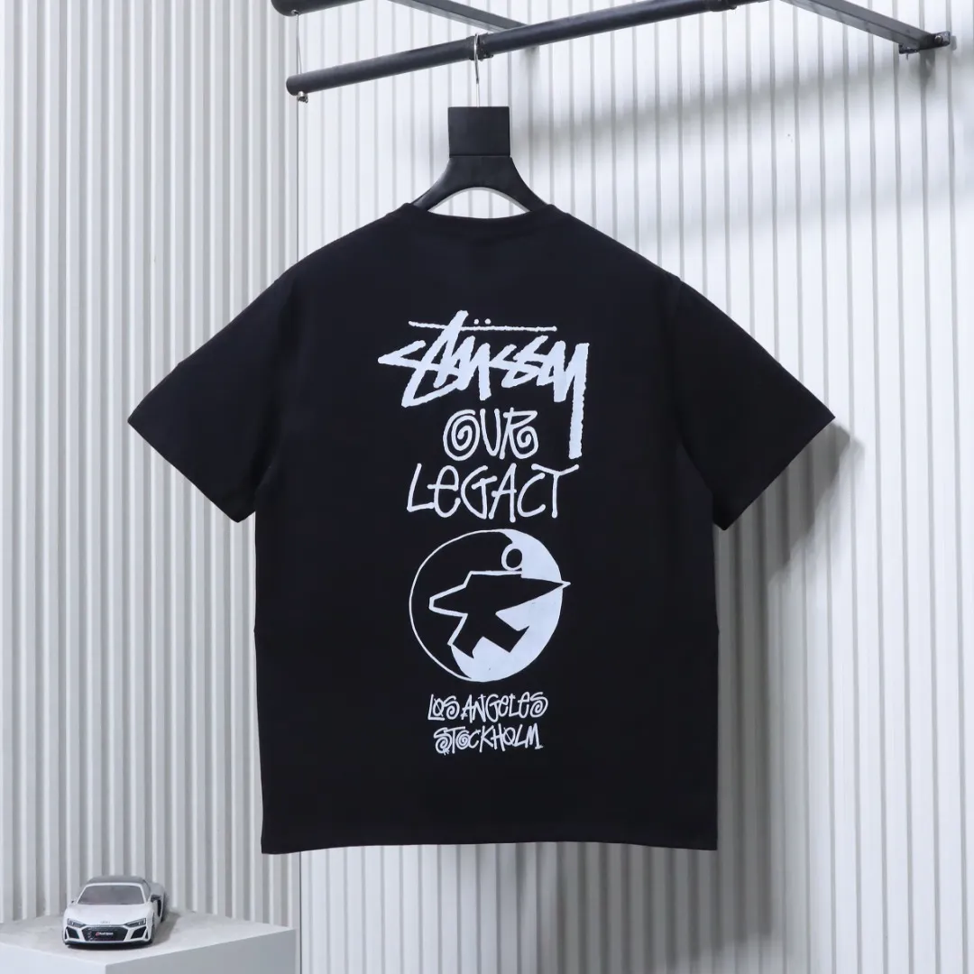 Back of Stussy World Tour Printed Short Sleeve T-Shirt Color Black