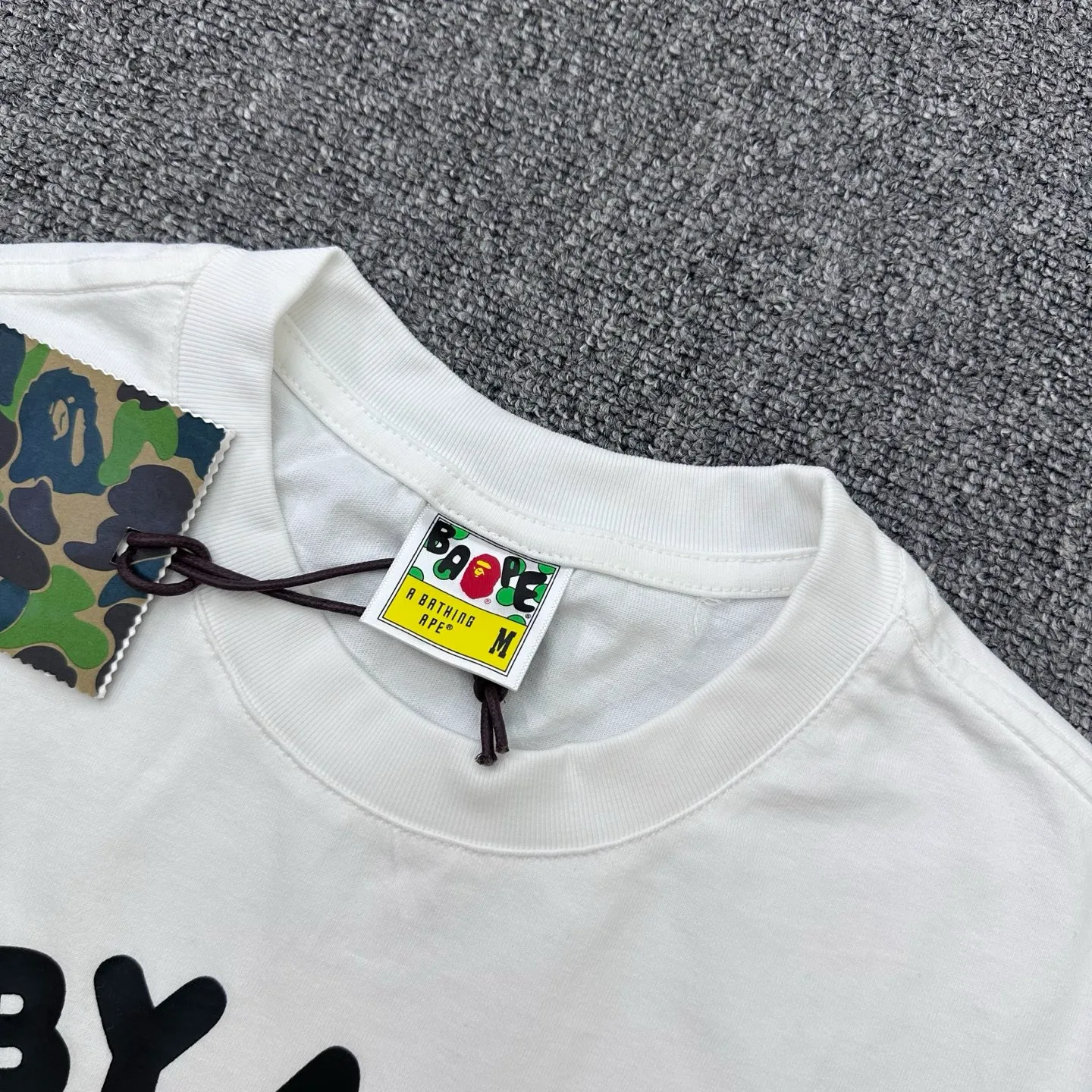 Neckline with visible Brand Tag and Label