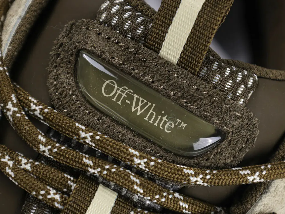 Off-White sneaker toe box detail with suede and mesh materials