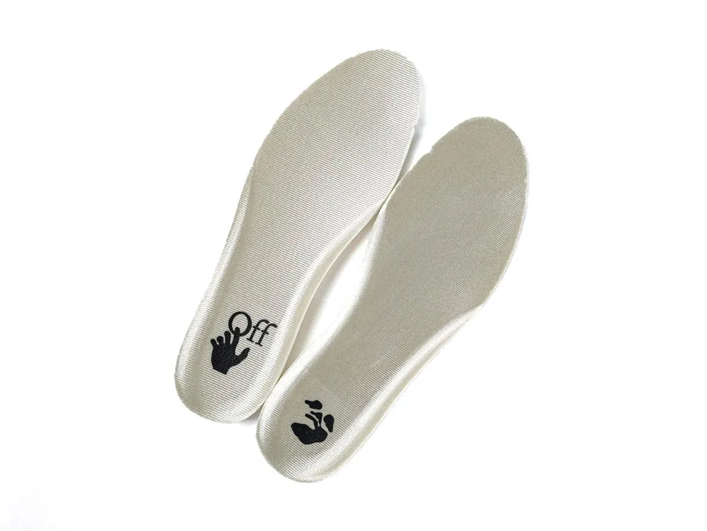 White textured insoles with black graphics, made from soft material for shoes.