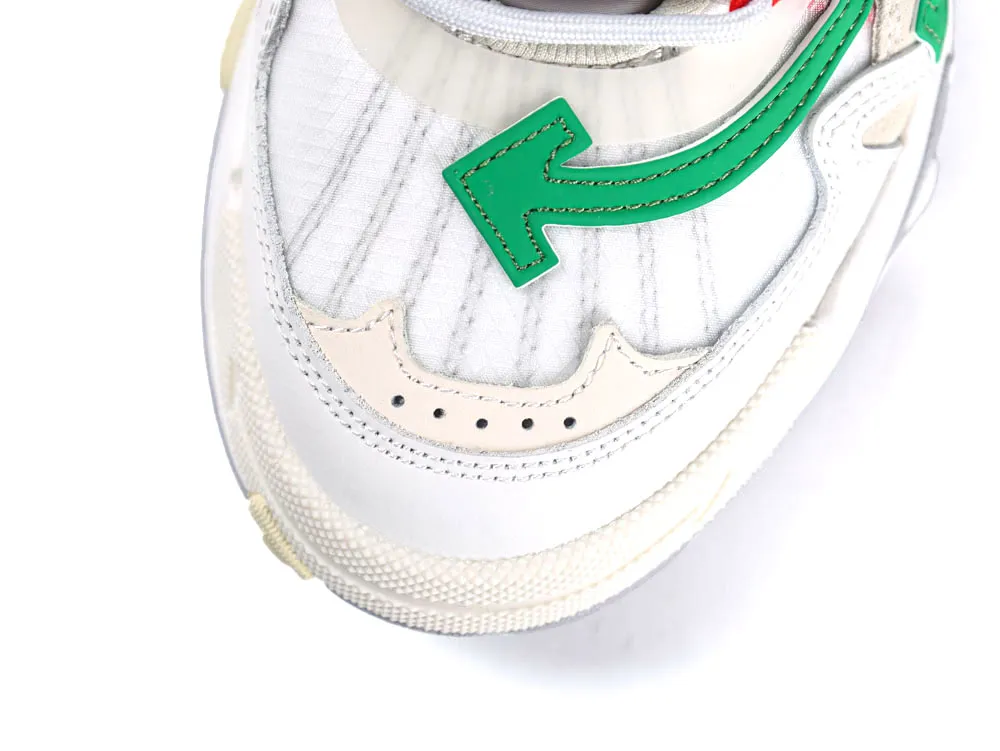 White and beige sneaker with green arrow detail, mesh and leather materials.