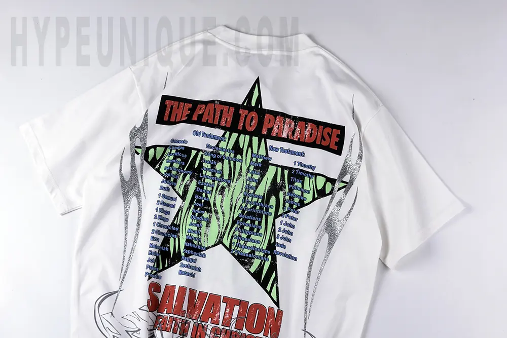 The front of the Hellstar Studios The Path to Paradise costume. Showing the white cotton material and the black and green star symbol.